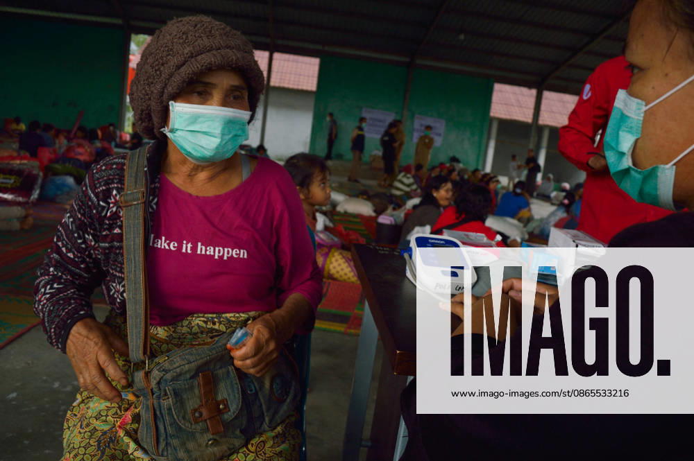 Residents Evacuate as Mount Sinabung Activity Intensifies - Indonesia Children are seen inside a temporary shelter at a communal hall in Sukatepu Village, Karo Regency, North Sumatra, Indonesia, on September 1, 2026, following renewed volcanic activity from Mount Sinabung. Displaced along with their families, these young evacuees receive basic supplies, face masks, and healthcare support as local authorities manage emergency relief efforts. Having experienced recurring eruptive phases, the communities remain vigilant while disaster management agencies update the dynamic hazard perimeters and evacuation routes across the region. The shelter operation was visited by North Sumatra Governor Bobby Nasution, who inspected the distribution of reli