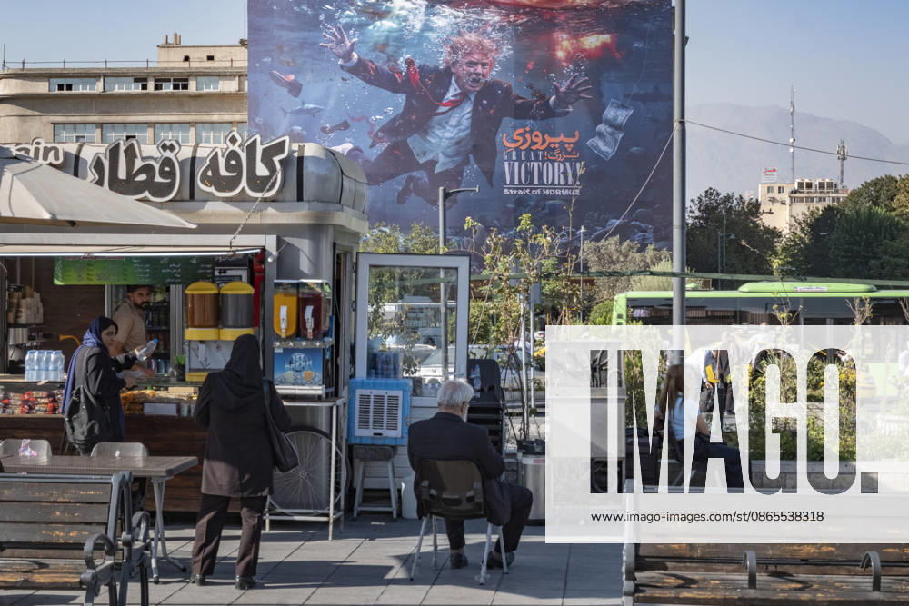 Anti Trump New Billboard In Tehran A view of an outdoor cafe beneath a new anti-U.S. billboard featuring President Donald Trump alongside a slogan reading, Great Victory, Strait of Hormuz , in southern Tehran, Iran, on September 1, 2026, amid new tensions between Iran and the United States. U.S. forces strike two Iranian military launchers on Larak Island in the Strait of Hormuz on August 30, in the first reported U.S. attack on Iranian territory since late July. Tehran Tehran Iran