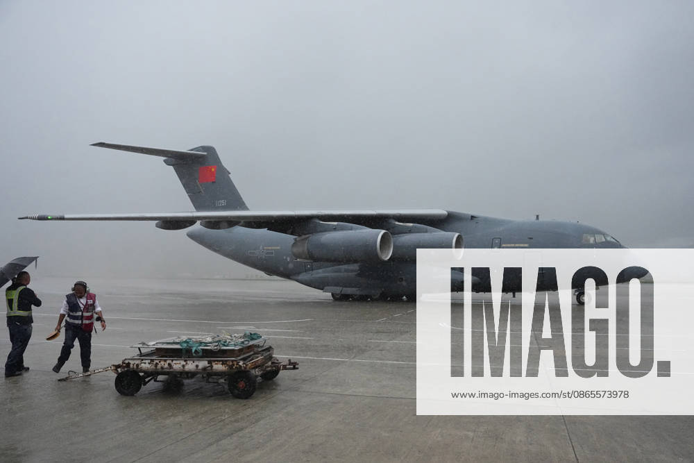 A Y-20 transport aircraft carrying China s second batch of aid supplies to Nepal taxis to its parking spot in heavy rain on September 1, 2026 in Kathmandu, Nepal. The shipment includes drones, DNA testing kits and reagents, water purification equipment, and lighting devices based on Nepal s actual needs, while five Chinese DNA identification experts arrived on the same flight.