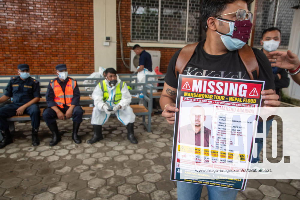 Personnel from the Nepal Police Disaster Management Office (DMO) wearing protective suits stand guard and manage victim identification lists at Tribhuvan University Teaching Hospital in Kathmandu. Authorities continue to verify identities of those affected by the catastrophic flooding along the Nepal-Tibet border. Kathmandu Nepal - ZUMAs197 20260901_aaa_s197_189