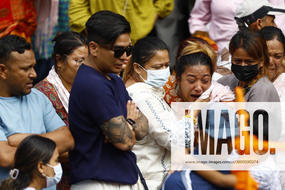 Ayusha Timilsina, 27, mourns the death of her husband, Suraj Timilsina, 32, while cremating a symbolic effigy made of straw and barley grains after his body could not be recovered following the devastating floods, at Pashupatinath Temple in Kathmandu, Nepal, on Wednesday, September 2, 2026. Suraj, originally from Sindhupalchok, was involved in an import-export and transport business in Timure, Rasuwa, and was swept away by the floods. He is survived by his wife and their six-year-old son and three-year-old daughter. As thousands remain missing and many bodies have yet to be recovered, families have begun performing final rites for loved ones without their remains. The floods have killed more than 1,000 - ZUMAg200 20260902_zap_g200_006