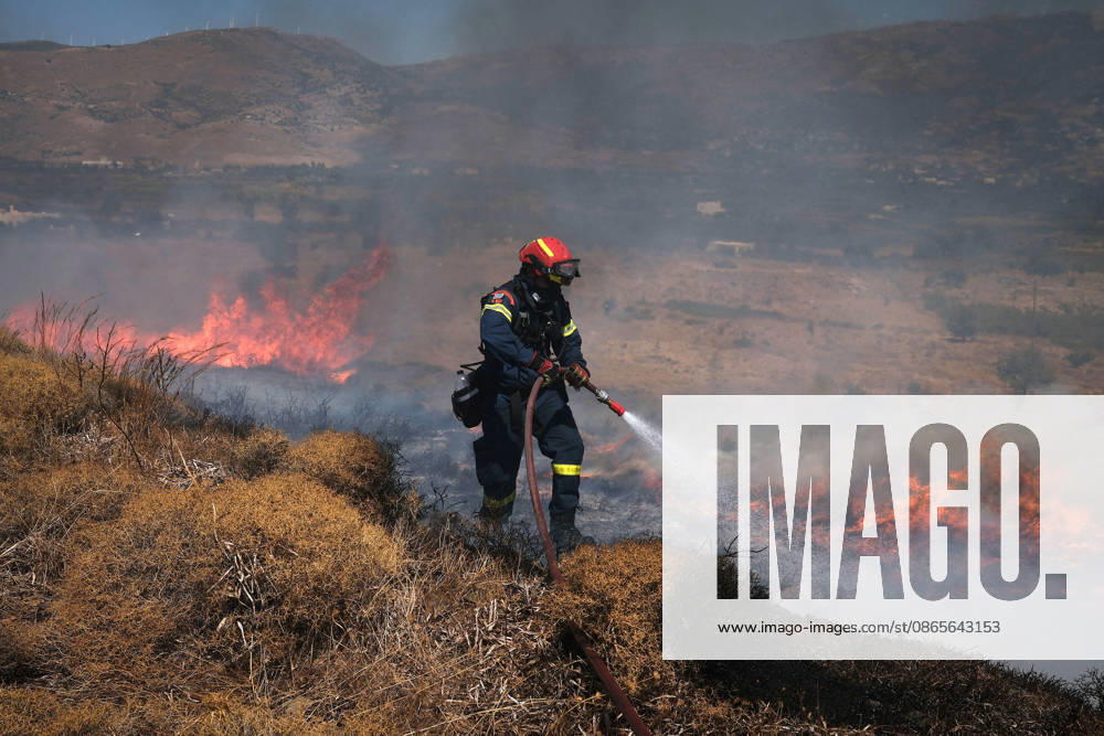 Wildfire near Karystos on Greece s Evia Island EVIA, GREECE - SEPTEMBER 2: Firefighters battle a wildfire burning near Karystos on the island of Evia, Greece, on September 2, 2026 Costas Baltas Anadolu Evia Greece. Editorial use only. Please get in touch for any other usage.