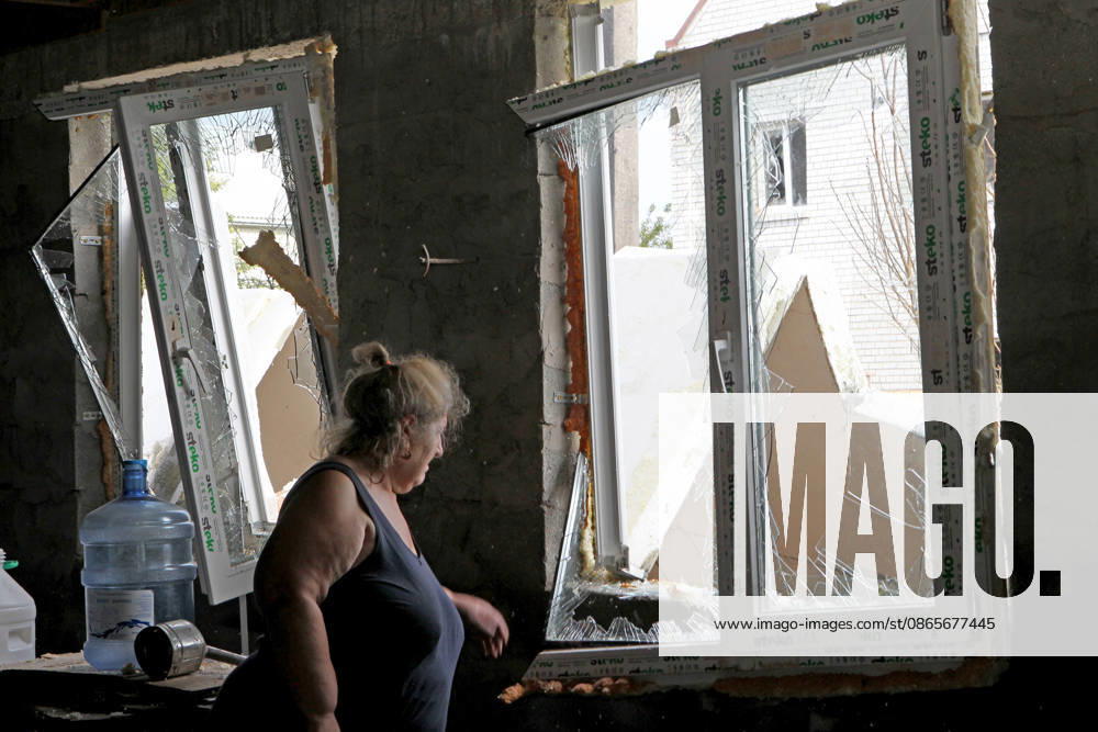 Two people injured in Russian drone attack on Dnipro residential area A woman stands by windows shattered by the blast wave in a private house damaged in a Russian drone attack in one of the districts of Dnipro, Ukraine, on September 1, 2026. The Russian attack damaged private houses, a business, and a school stadium. Two women, aged 58 and 63, were hospitalized with injuries, Credit:Mykola Miakshykov Ukrinform Avalon Ukraine, Dnipro
