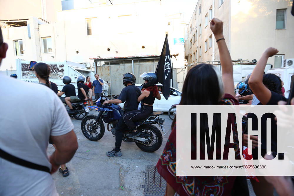 Supporters raise their fists as a motorcycle convoy arrives at the Prosfygika housing complex in Athens ahead of the return of Aristotelis Chantzis. Athens Greece - ZUMAx103 20260902_zip_x103_002