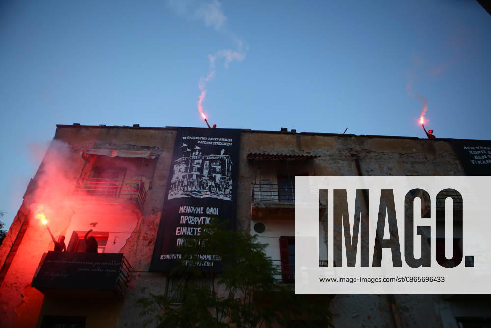 Supporters hold burning flares during a solidarity gathering at the Prosfygika housing complex in Athens, ahead of the return of Aristotelis Chantzis following his release from Evangelismos Hospital. Athens Greece - ZUMAx103 20260902_zip_x103_007
