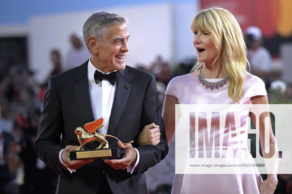 George Clooney poses on the red carpet with Laura Dern after receiving the Golden Lion for Lifetime Achievement Award during the Opening Ceremony the 83rd Venice International Film Festival at Sala Grande on September 2, 2026 in Venice, Italy. VFF20260902871 RoccoxSpaziani
