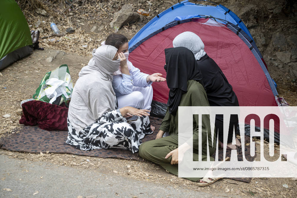Women and children wait at the gates of La Hípica to be taken in. Migrant families wait at the gates of the La Hípica Equestrian Center in Ceuta, on September 3, 2026, in Ceuta, Spain. Dozens of migrant women with their children are waiting in makeshift camps to be housed at the La Hípica Equestrian Center. On August 31, the center began receiving migrant women and girls who had been staying in various temporary settlements throughout the city, as part of the initiative launched to dismantle these camps and transfer their occupants to temporary shelter facilities set up by the authorities. SEPTEMBER 3, 2026 PIXELATED MIGRATION CRISIS Ceuta Ceuta, Spain
