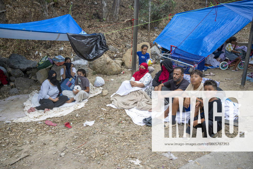 Women and children wait at the gates of La Hípica to be taken in. Migrant families wait at the gates of the La Hípica Equestrian Center in Ceuta on September 3, 2026, in Ceuta, Spain. Dozens of migrant women with their children are waiting in makeshift camps to be housed at the La Hípica Equestrian Center. On August 31, the center began receiving migrant women and girls who had been staying in various temporary settlements throughout the city, as part of the operation launched to dismantle these camps and transfer their occupants to temporary shelter facilities set up by the authorities. SEPTEMBER 3, 2026 PIXELATED MIGRATION CRISIS Ceuta Ceuta, Spain