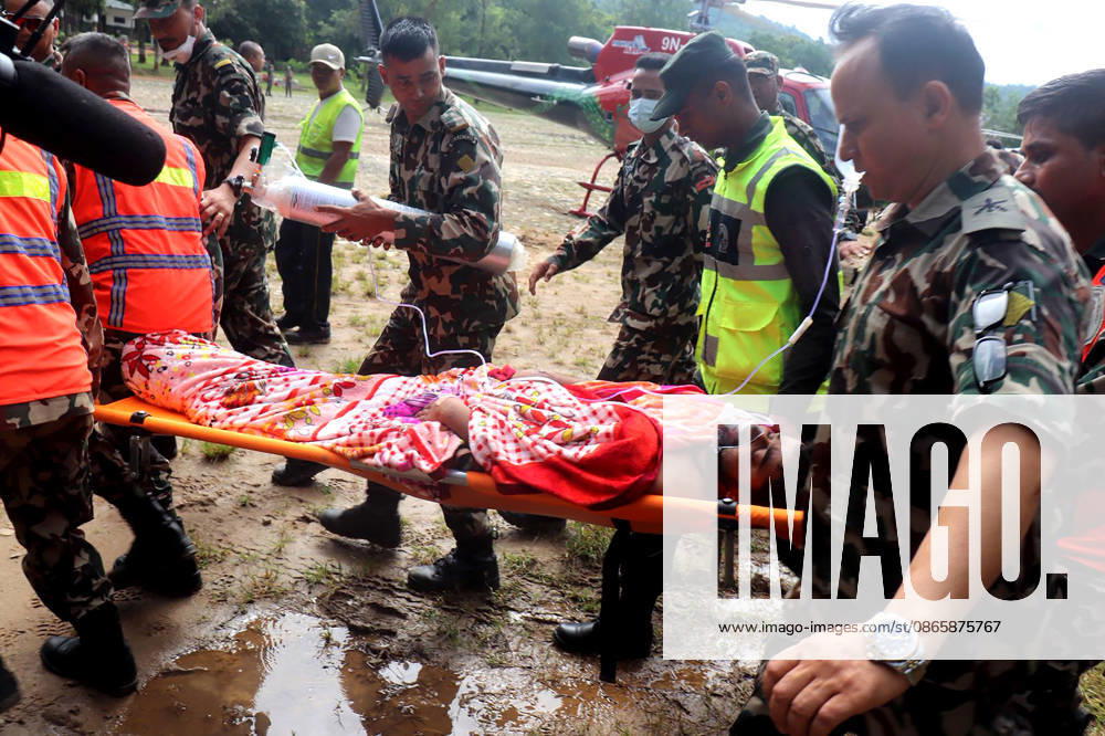(260904) -- KATHMANDU, Sept. 4, 2026 -- Rescuers transfer a worker rescued alive in Rasuwa district, Nepal, Sept. 4, 2026. Two men trapped inside the tunnel of the Trishuli 3A hydropower project, which was badly affected by last week s deadly mudslide, were rescued alive on Friday, the Nepali Army said. ( via Xinhua) (SpotNews)NEPAL-MUDSLIDE-TWO WORKERS-TUNNEL-RESCUE RSS