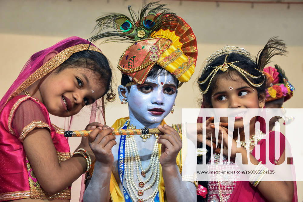 Celebrations of Dahi Handi Festival at Sane Guruji High School in Mumbai Mumbai, Sep 04 (ANI): Students dressed as Lord Krishna and Goddess Radha pose for a photo during Dahi Handi celebrations at Sane Guruji High School, in Mumbai on Friday. Mumbai Maharashtra India