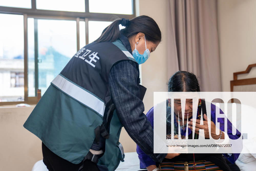 (260905) -- GYIRONG, Sept. 5, 2026 -- A doctor provides Tibetan medicine treatment to a villager in Gyirong County, southwest China s Xizang Autonomous Region, Sept. 5, 2026. After a mudslide struck Gyirong Port on the China-Nepal border in southwest China s Xizang Autonomous Region, local authorities have organized Tibetan medicine doctors to provide medical treatment and psychological counseling services to affected residents at a resettlement site. ) CHINA-XIZANG-GYIRONG-MUDSLIDE-MEDICAL CARE (CN) KalsangxBaljor