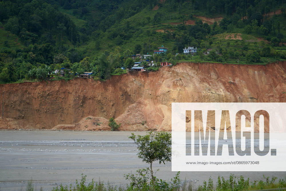 A massive landslide triggered by continuous riverbank erosion caused by a recent flash flood along the Trishuli River threatens a hillside settlement in Darshantar, Nuwakot, Nepal, on September 5, 2026. Nuwakot Nepal - ZUMAd164 20260905_zip_d164_001