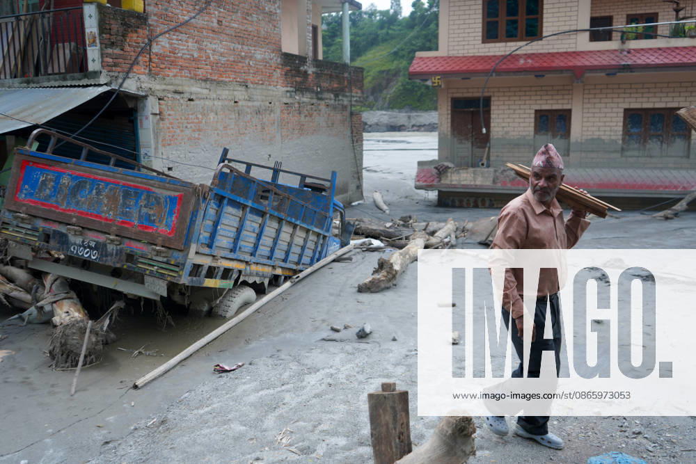 A man walks through houses damaged by a recent flash flood along the bank of the Trishuli River in Nuwakot, Nepal, on September 5, 2026. Nuwakot Nepal - ZUMAd164 20260905_zip_d164_007