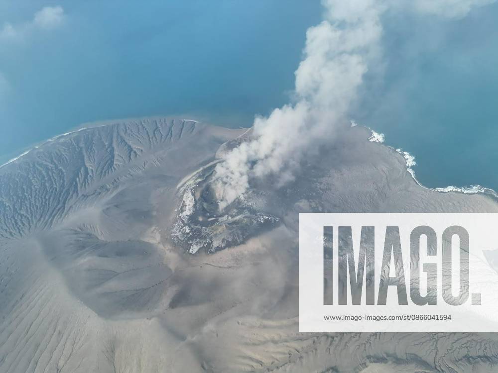 (260906) -- LAMPUNG PROVINCE, Sept. 6, 2026 -- An aerial drone photo provided by Indonesia s Center for Volcanology and Geological Hazard Mitigation () shows volcanic materials spewing from Mount Anak Krakatau in Lampung province, Indonesia, Sept. 6, 2026. Indonesia s Soekarno-Hatta International Airport near Jakarta was temporarily closed early Sunday after volcanic ash from an eruption of Mount Anak Krakatau was detected in the airport area, disrupting dozens of flights, the Ministry of Transportation said. In addition to Soekarno-Hatta International Airport, authorities temporarily closed Halim Perdanakusuma Airport in Jakarta, Budiarto Airport in Curug, Tangerang and Radin Inten II Airport in Lampung. ( Handout via Xinhua) INDONESIA-