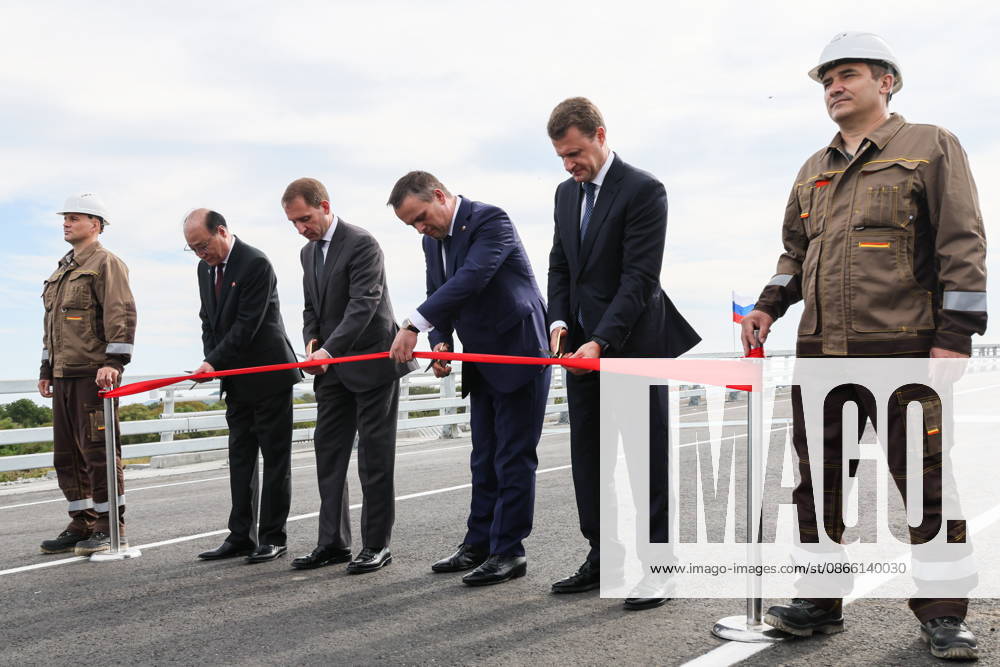 RUSSIA, PRIMORYE REGION - SEPTEMBER 7, 2026: Alexei Chekunkov, Russia s Far East and Arctic Development Minister, Andrei Nikitin, Transport Minister, Alexander Kozlov, Natural Resources and Environment Minister, and Sin Hong-chol (R-L centre), Ambassador of North Korea, cut the ribbon during a ceremony to unveil a bridge named after Red Army officer Yakov Novichenko (1914-1994) for saving Kim Il Sung s life and built as a road crossing between Russia and North Korea Russia - ZUMAt113 20260907_zaa_t113_040