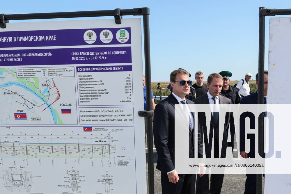 RUSSIA, PRIMORYE REGION - SEPTEMBER 7, 2026: Alexei Chekunkov, Russia s Far East and Arctic Development Minister, and Alexander Kozlov (L-R front), Natural Resources and Environment Minister, attend a ceremony to unveil a bridge named after Red Army officer Yakov Novichenko (1914-1994) for saving Kim Il Sung s life and built as a road crossing between Russia and North Korea Russia - ZUMAt113 20260907_zaa_t113_045