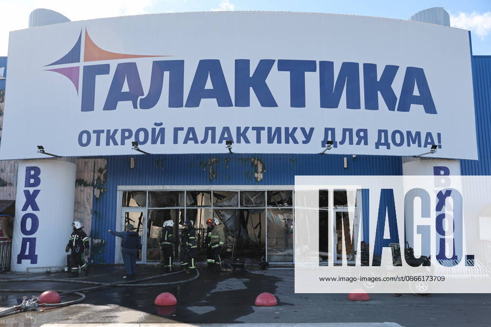 RUSSIA, MARIUPOL - SEPTEMBER 7, 2026: Russia s Emergencies Ministry employees are seen outside the Galaktika shopping centre damaged in a Ukrainain drone attack. Dmitry Yagodkin TASS 97290991