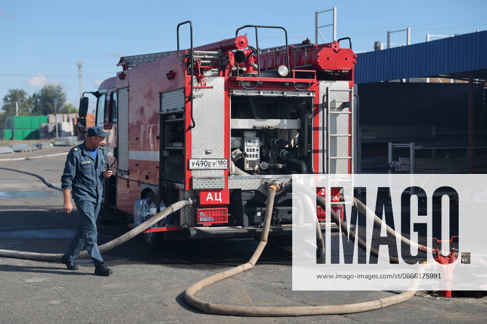 RUSSIA, MARIUPOL - SEPTEMBER 7, 2026: A Russia s Emergencies Ministry employee responds to a fire caused by a Ukrainian drone strike on the Galaktika shopping centre. Dmitry Yagodkin TASS 97290966