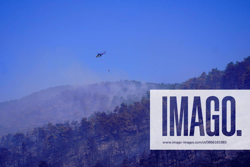 Wildfire in Mugla MUGLA, TURKIYE - SEPTEMBER 7: Firefighting aircraft continue cooling operations after a forest fire that broke out in the Mentese district and spread to the Ula district was largely brought under control following aerial and ground intervention in Mugla, Turkiye, on September 7, 2026. Osman Akca Anadolu Mugla Turkey. Editorial use only. Please get in touch for any other usage.