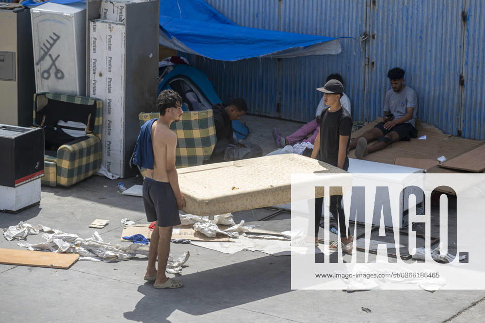 Migration Situation in the Tarajal Warehouses in Ceuta: Migrants living in one of the Tarajal warehouses, as of September 7, 2026, in Ceuta, Spain. The government has taken control of the port of Ceuta to provide humanitarian assistance to migrants in tents and other spaces. Specifically, the department led by Óscar Puente authorizes the Secretary of State for Migration to temporarily use an area of 16,000 square meters of public port land. SEPTEMBER 7, 2026 Ceuta, Spain