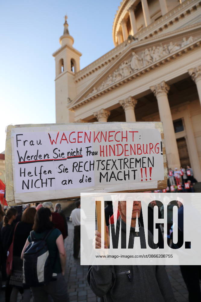 A protester holding a sign that reads Ms. Wagenknecht, don’t become Ms. Hindenburg—don’t help the far right come to power during a rally against the Alternative for Germany (AfD) party following its victory in the state election in Saxony-Anhalt, Alter Markt, Potsdam, September 7, 2026. Rally against the AfD in Potsdam