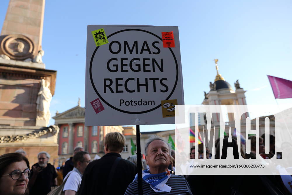 A protester holding a sign reading Omas Gegen Rechts Potsdam during a rally against the Alternative for Germany (AfD) party following its victory in the state election in Saxony-Anhalt, Alter Markt, Potsdam, September 7, 2026. Rally against the AfD in Potsdam