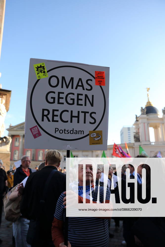 A protester holding a sign reading Omas Gegen Rechts Potsdam during a rally against the Alternative for Germany (AfD) party following its victory in the state election in Saxony-Anhalt, Alter Markt, Potsdam, September 7, 2026. Rally against the AfD in Potsdam
