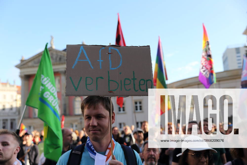 A protester holding a sign reading Ban the AfD during a rally against the Alternative for Germany (AfD) party following its victory in the state election in Saxony-Anhalt, Alter Markt, Potsdam, September 7, 2026. Rally against the AfD in Potsdam