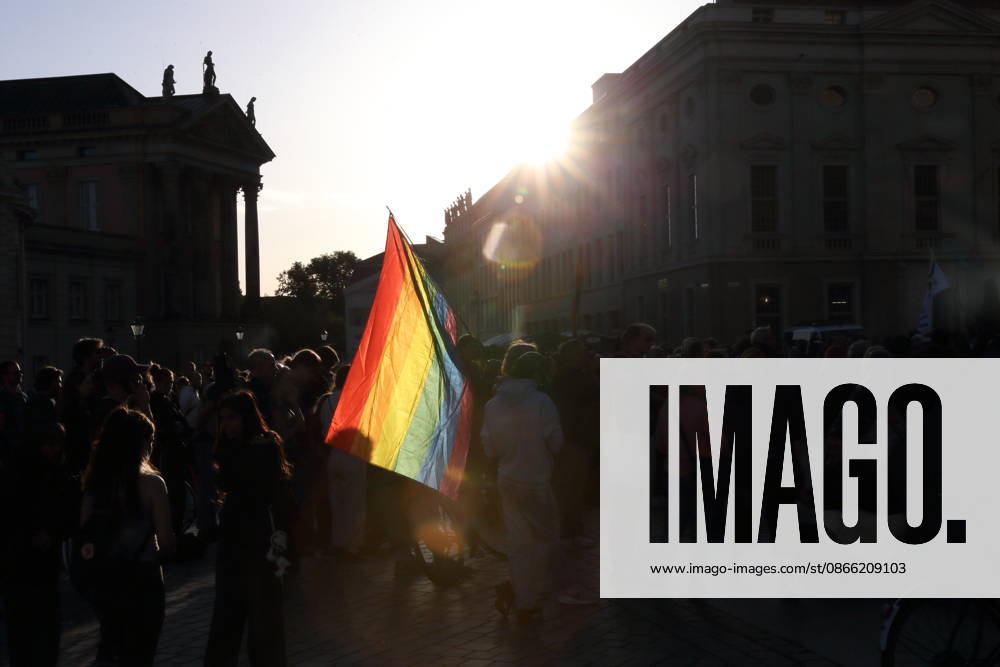 Protesters holding a rainbow flag during a rally against the Alternative for Germany (AfD) party following its victory in the state election in Saxony-Anhalt, Alter Markt, Potsdam, September 7, 2026; Rally against the AfD in Potsdam