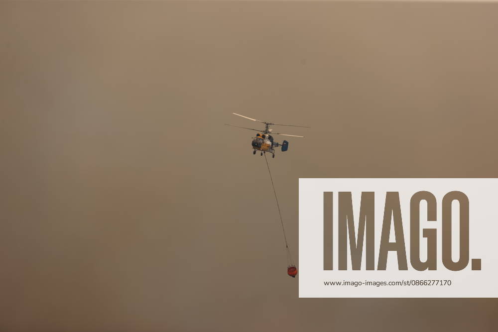 Wildfire breaks out in forested areas of Aksu and Kepez in Antalya ANTALYA, TURKIYE - SEPTEMBER 8: Firefighting teams battle a widespread wildfire spreading across forested areas in the Aksu and Kepez districts of Antalya, Turkiye, on September 8, 2026. Emergency crews deployed aircraft, water tenders, and ground personnel to conduct coordinated air and land containment operations as flames advanced rapidly through wooded terrain in the evening hours. Suleyman Elcin Anadolu Antalya Turkey. Editorial use only. Please get in touch for any other usage.