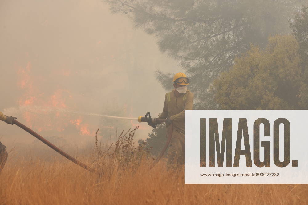 Wildfire breaks out in forested areas of Aksu and Kepez in Antalya ANTALYA, TURKIYE - SEPTEMBER 8: Firefighting teams battle a widespread wildfire spreading across forested areas in the Aksu and Kepez districts of Antalya, Turkiye, on September 8, 2026. Emergency crews deployed aircraft, water tenders, and ground personnel to conduct coordinated air and land containment operations as flames advanced rapidly through wooded terrain in the evening hours. Suleyman Elcin Anadolu Antalya Turkey. Editorial use only. Please get in touch for any other usage.
