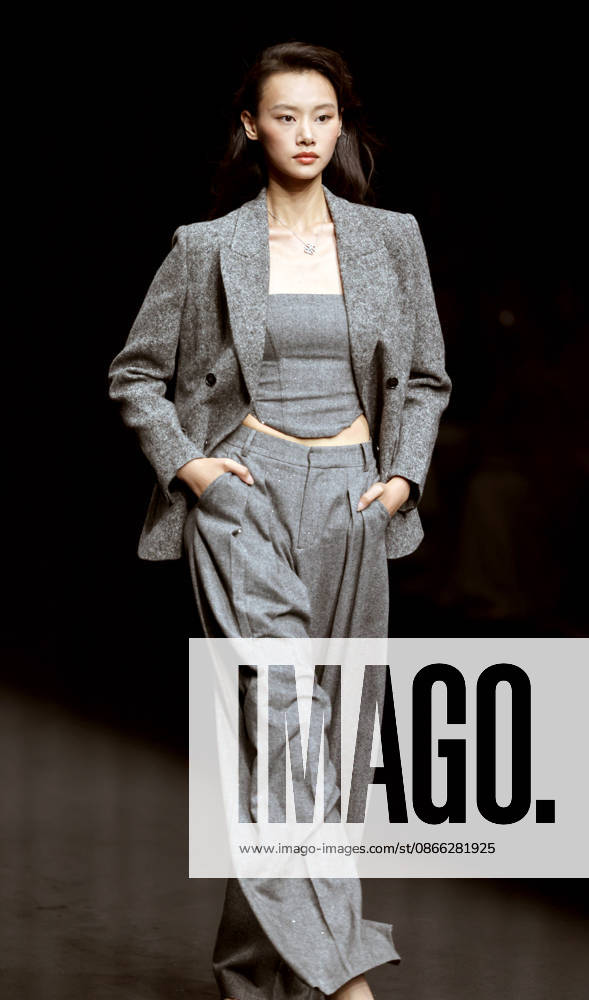 SYNA brand fashion is displayed on the runway at the China International Fashion Week Autumn 2026 on September 7, 2026 in Beijing, China. The event showcases collections from various designers for the upcoming autumn and winter seasons.
