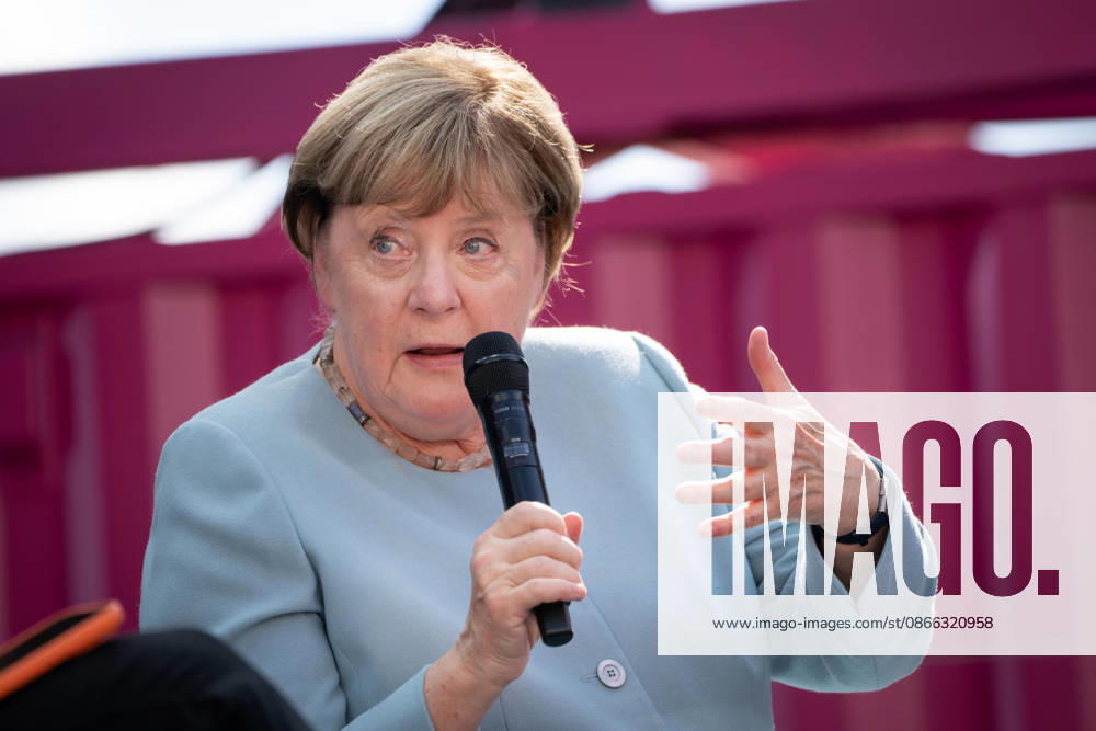 Digital X 2026: Dr. Angela Merkel, former German Chancellor, with a distinctive look and gesture on the Harbor Stage at Digital X 2026. DIGITAL X is Europe’s leading cross-industry digitaliza