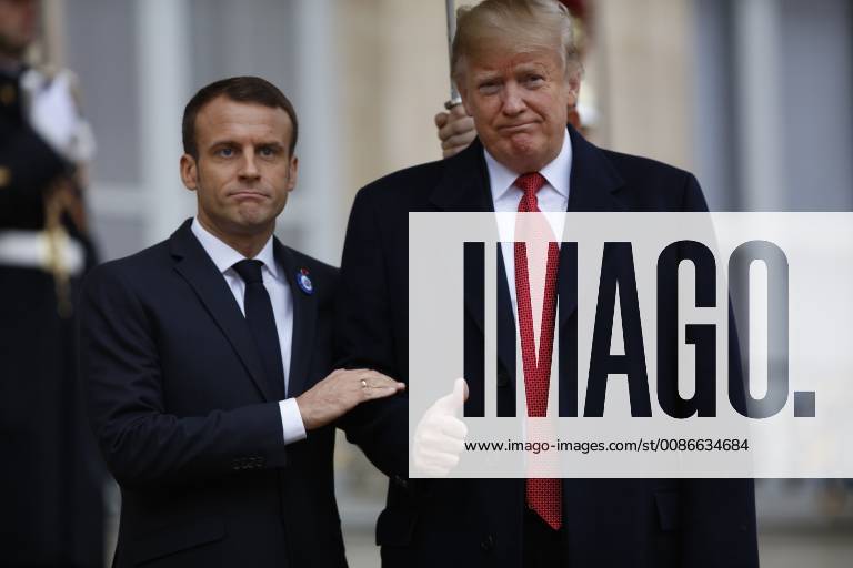 Paris, France - French President Emmanuel Macron welcomes U.S. President Donald Trump prior to their meeting at the Elysee Presidential Palace on November 10, 2018 in Paris, France. President Trump is in Paris to participate in the international ceremony of the Armistice Centenary of 1918 at the Arc de Triomphe on November 11, 2018. Heads of State from around the world are meeting in Paris to commemorate the end of the first World War (WWI) Paris France - ZUMAn230 20181110_zaa_n230_317