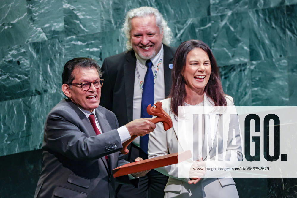 ANNALENA BAERBOCK, President of the 80th session of the UN General Assembly, hands the General Assembly gavel to KHALILUR RAHMAN, incoming President of the 81st session, during the closing plenary meeting of UNGA80 at UN Headquarters. The handover marks the transition of the General Assembly presidency from its 80th to 81st session. New York United States - ZUMAo116 20260908_znp_o116_043