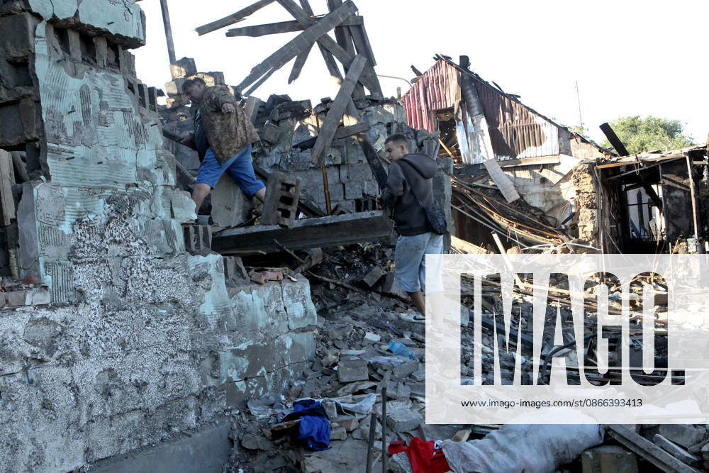 People inspect a private house destroyed in a Russian drone attack, Dnipro, Ukraine, September 9, 2026. On Wednesday night, September 9, Russian drones struck the eastern Ukrainian city. The attack caused fires at warehouses storing building materials and at a private house. Rescuers freed three people, including a 15-year-old boy, from the basement of the damaged home. A 51-year-old man and a 52-year-old woman were taken to hospital. (Photo by Mykola Miakshykov Ukrinform) Aftermath of Russian drone attack in Dnipro