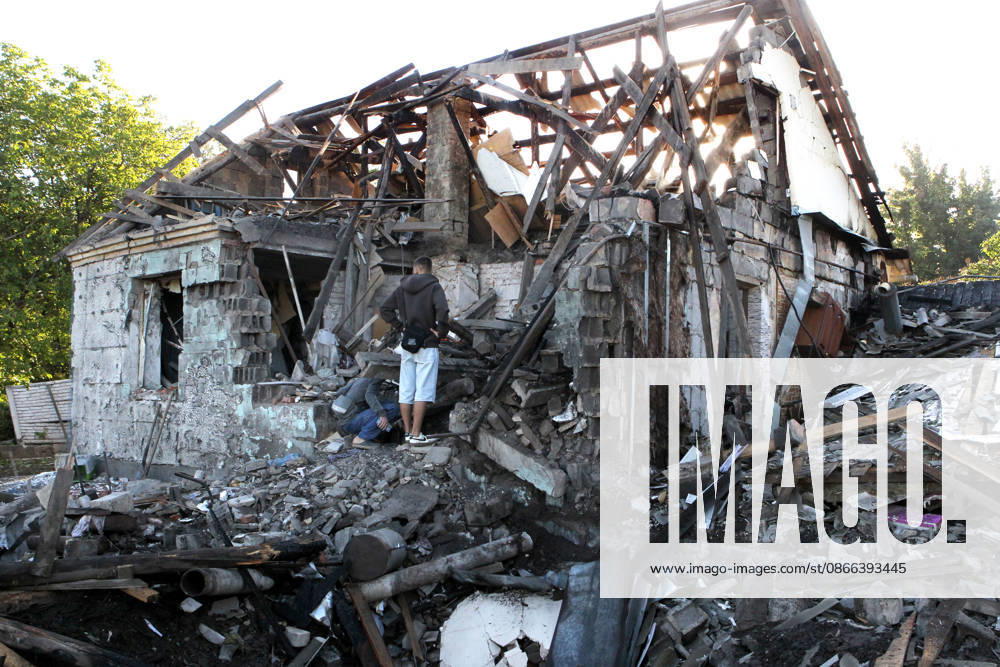 People inspect a private house destroyed in a Russian drone attack, Dnipro, Ukraine, September 9, 2026. On Wednesday night, September 9, Russian drones struck the eastern Ukrainian city. The attack caused fires at warehouses storing building materials and at a private house. Rescuers freed three people, including a 15-year-old boy, from the basement of the damaged home. A 51-year-old man and a 52-year-old woman were taken to hospital. (Photo by Mykola Miakshykov Ukrinform) Aftermath of Russian drone attack in Dnipro