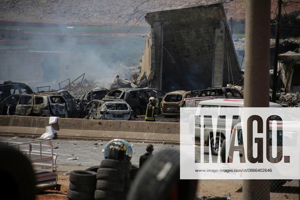4 killed in explosion in Syria s Idlib province IDLIB, SYRIA - SEPTEMBER 09: Smoke rises after a powerful explosion, the cause of which has not yet been determined, at a warehouse where war remnant munitions were being collected near the Sarmada district of Idlib province in northwestern Syria on September 09, 2026. Police, ambulance, firefighting, and civil defense teams were dispatched to the area. Kasim Yusuf Anadolu Idlib Syria. Editorial use only. Please get in touch for any other usage.