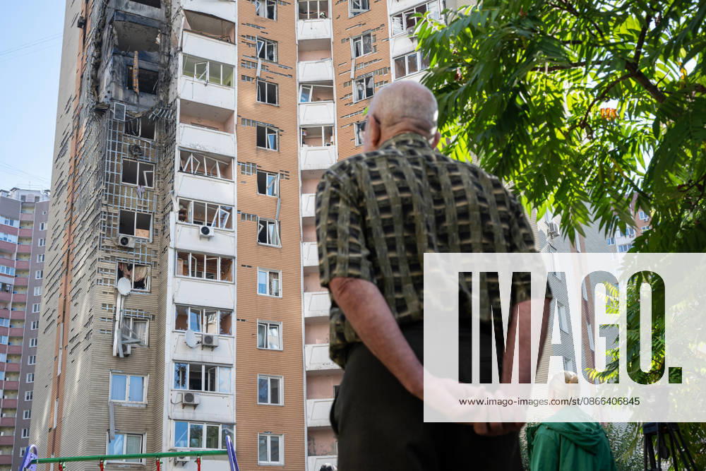 People face a 24-storey apartment block damaged by a Russian attack in the Darnytskyi district of Kyiv, Ukraine, September 9, 2026. On Wednesday morning, September 9, a Russian drone hit the 24-storey building on the 12th floor. According to police, five people were injured, including a pregnant woman. (Photo by Danylo Antoniuk Ukrinform) Apartment block hit by Russian drone in Kyiv