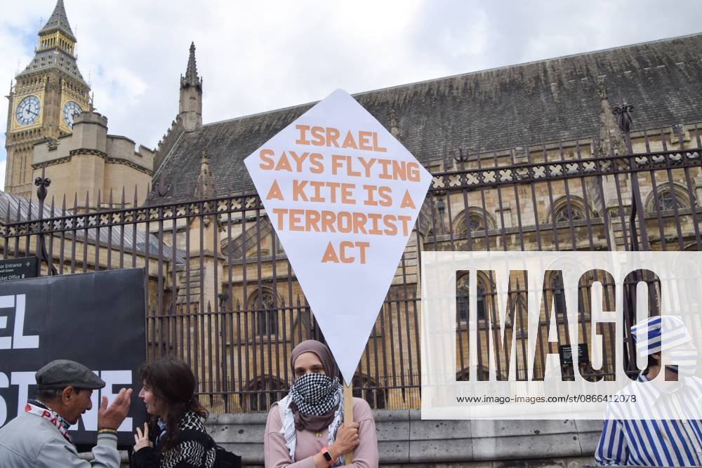 A protester holds a placard stating Israel says flying a kite is a terrorist act during the demonstration..Protesters gathered in Parliament Square in support of Palestine and against what the protesters call a pro-Israel and Zionist influence in UK politics. London United Kingdom - ZUMAs197 20260909_aaa_s197_112