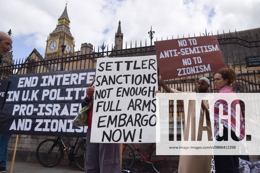Protesters hold placards stating Settler sanctions not enough, full arms embargo now and No to anti-semitism, no to Zionism during the demonstration..Protesters gathered in Parliament Square in support of Palestine and against what the protesters call a pro-Israel and Zionist influence in UK politics. London United Kingdom - ZUMAs197 20260909_aaa_s197_115
