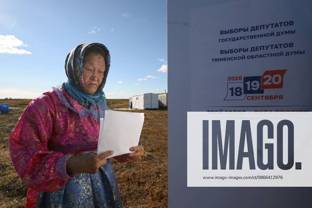 Russia Parliamentary Election Early Voting 9239452 09.09.2026 A member of a local indigenous community reads a ballot during the early voting in remote areas ahead of State Duma elections at a reindeer camping ground, in Yamalo-Nenets Autonomous Area, Russia. Russians will vote in State Duma, the lower house of parliament, and municipal elections over three days, from September 18-20. Alexandr Kryazhev Sputnik Yamalo-Nenets Autonomous Area Russia