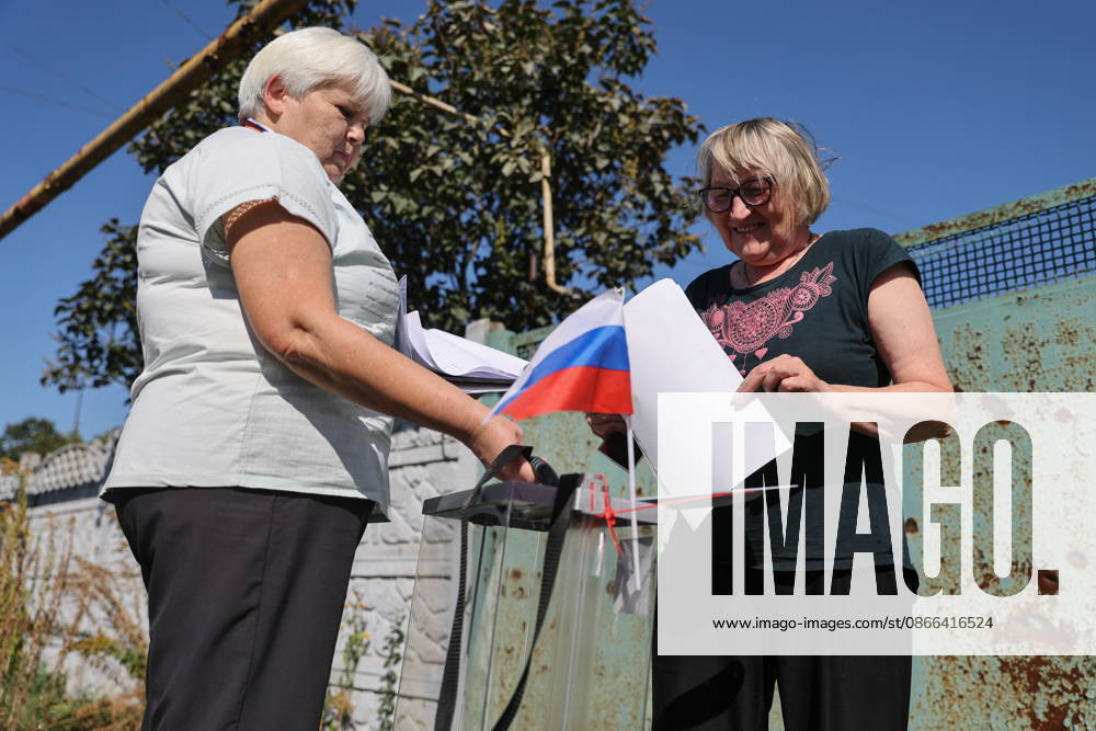 RUSSIA, DONETSK - SEPTEMBER 9, 2026: Citizens participate in early voting in the 2026 State Duma elections in Oktyabrsky. Dmitry Yagodkin TASS 97412807