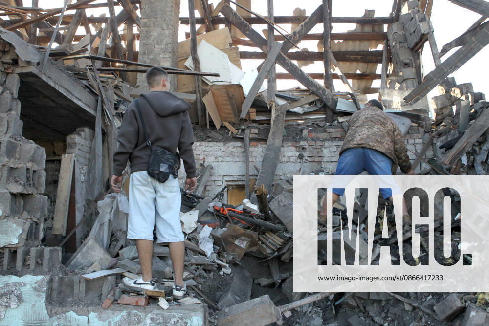 Aftermath of Russian drone attack in Dnipro People inspect a private house destroyed in a Russian drone attack in Dnipro, Ukraine, on September 9, 2026. On Wednesday night, September 9, Russian drones struck the eastern Ukrainian city. The attack caused fires at warehouses storing building materials and at a private house. Rescuers freed three people, including a 15-year-old boy, from the basement of the damaged home. A 51-year-old man and a 52-year-old woman were taken to hospital. Dnipro Ukraine