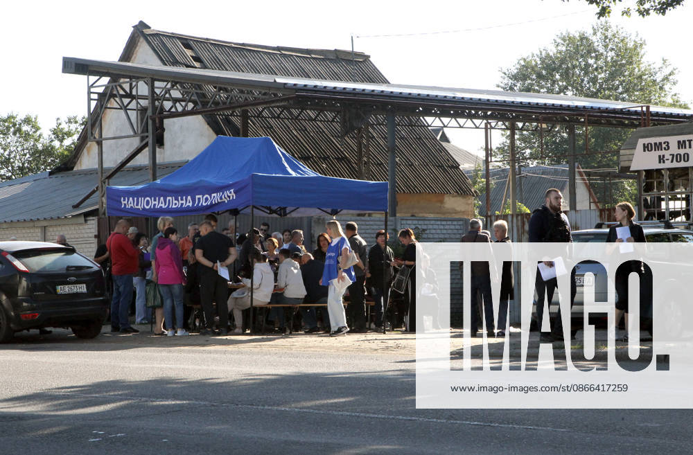 Aftermath of Russian drone attack in Dnipro People queue at a National Police tent to receive assistance and report war crimes after a Russian drone attack in Dnipro, Ukraine, on September 9, 2026. On Wednesday night, September 9, Russian drones struck the eastern Ukrainian city. The attack caused fires at warehouses storing building materials and at a private house. Rescuers freed three people, including a 15-year-old boy, from the basement of the damaged home. A 51-year-old man and a 52-year-old woman were taken to hospital. Dnipro Ukraine