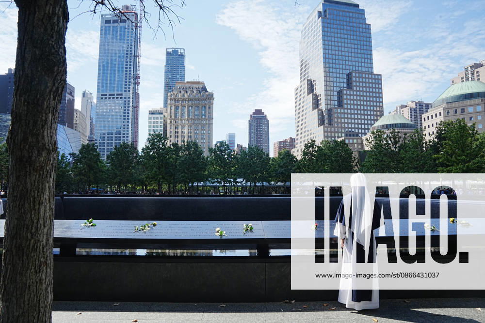 Sister Molly from New York s Sisters of Life looks over the North Tower reflecting pool ahead of the 25th anniversary of the attacks of September 11 at the 9 11 Memorial on September 9, 2026 in New York. New York USA - ZUMAb148 20260909_zap_b148_039