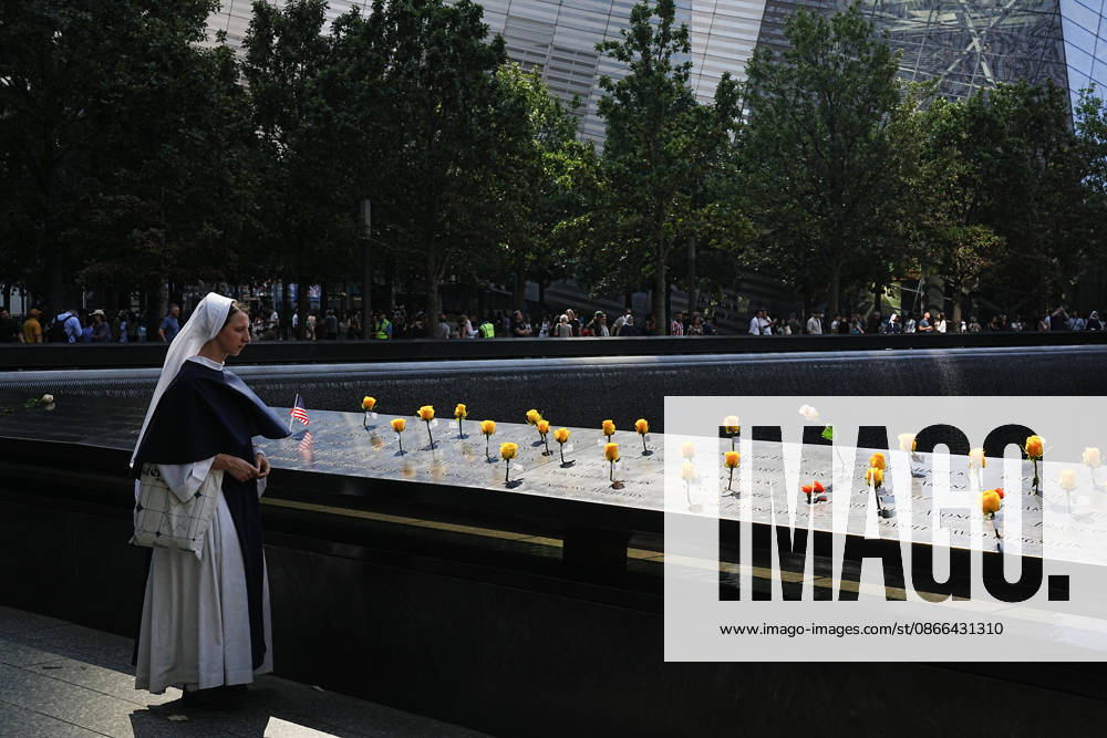 A Sister from New York s Sisters of Life looks over the North Tower reflecting pool ahead of the 25th anniversary of the attacks of September 11 at the 9 11 Memorial on September 9, 2026 in New York. New York USA - ZUMAb148 20260909_zap_b148_063