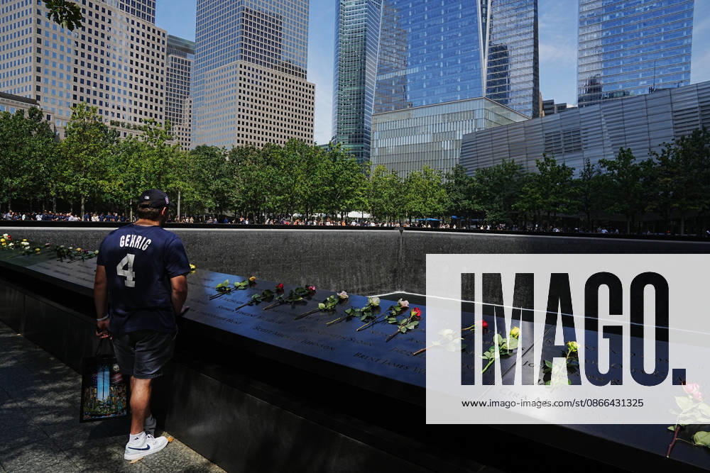 A visitor looks over the South Tower reflecting pool ahead of the 25th anniversary of the attacks of September 11 at the 9 11 Memorial on September 9, 2026 in New York. New York USA - ZUMAb148 20260909_zap_b148_072