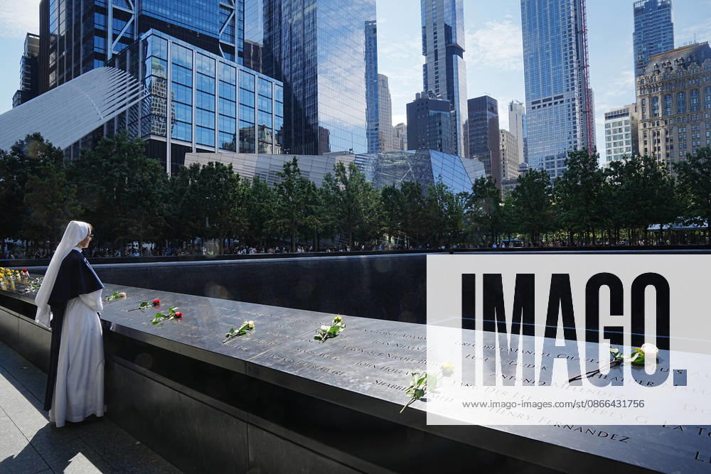 Sister Molly from New York s Sisters of Life looks over the North Tower reflecting pool ahead of the 25th anniversary of the attacks of September 11 at the 9 11 Memorial on September 9, 2026 in New York. New York USA - ZUMAb148 20260909_zap_b148_051