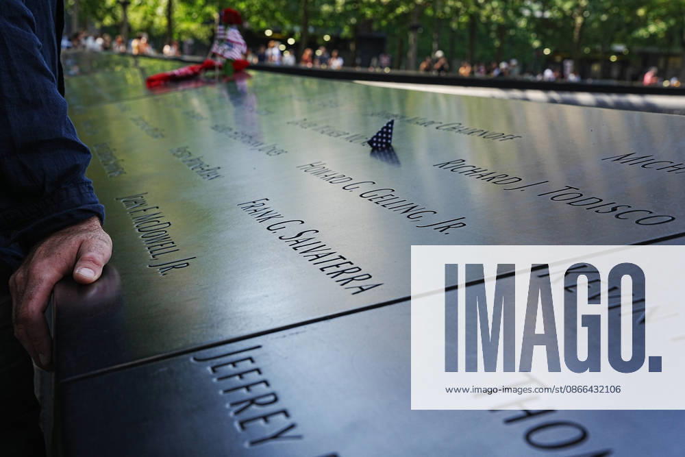 Visitors look over the South Tower reflecting pool ahead of the 25th anniversary of the attacks of September 11 at the 9 11 Memorial on September 9, 2026 in New York. New York USA - ZUMAb148 20260909_zap_b148_062